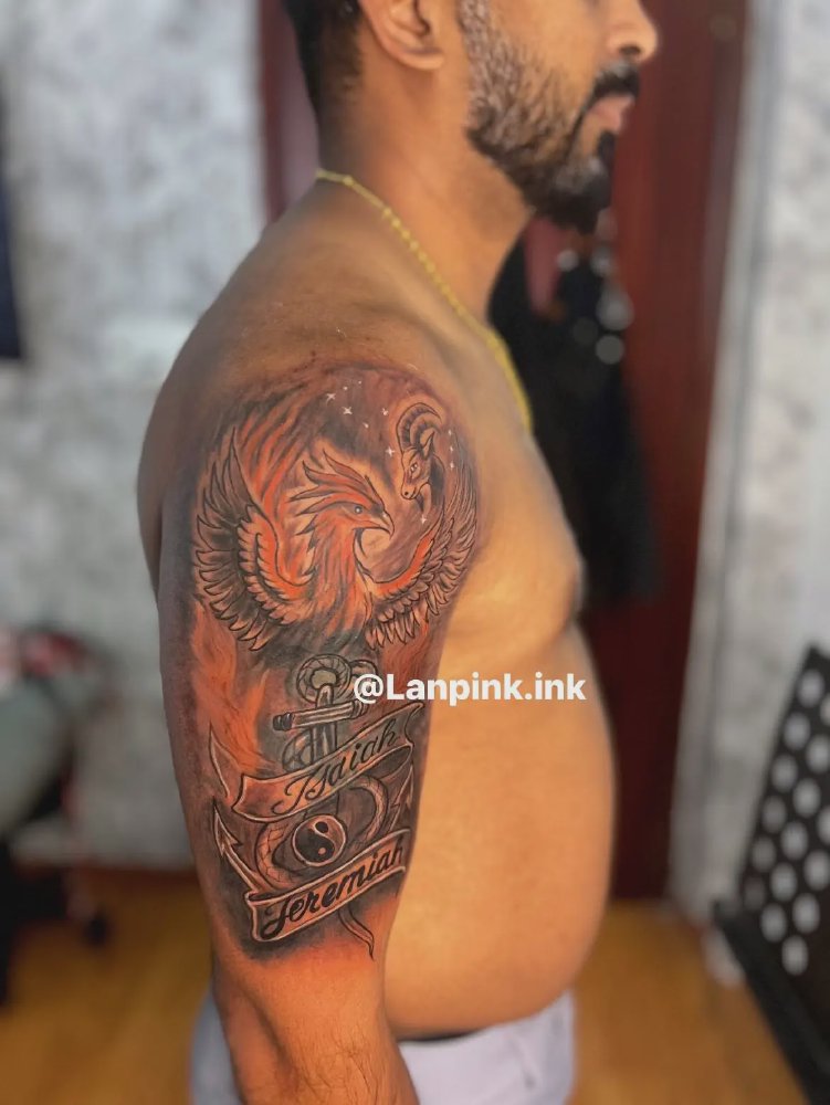 Hình xăm phượng hoàng ở bắp tay do Lan Pink Tattoo thiết kế và thực hiện tại Quận 12, TP.HCM